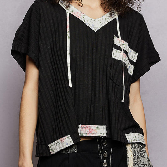 POL black short sleeve hooded top with open back detail — frontal display.
