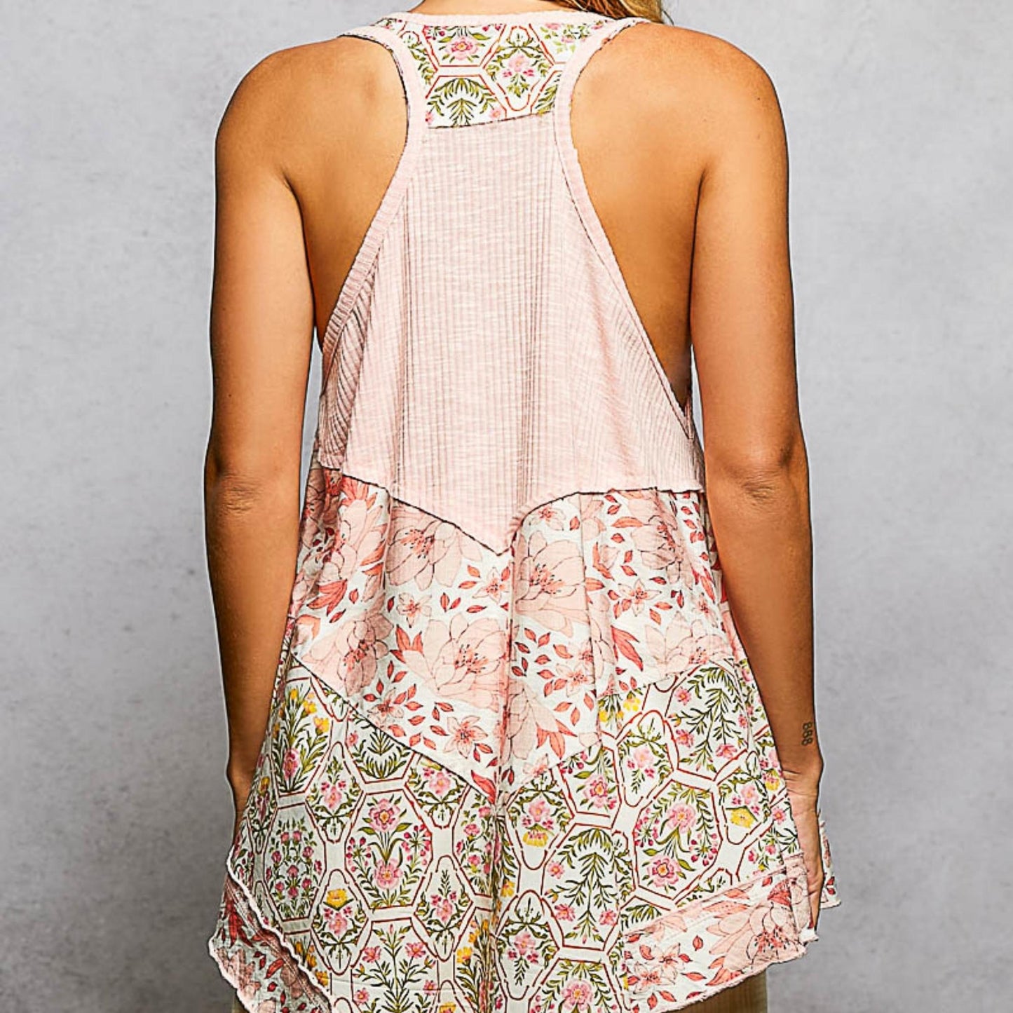 Back view of the POL blush pink ribbed sleeveless top.