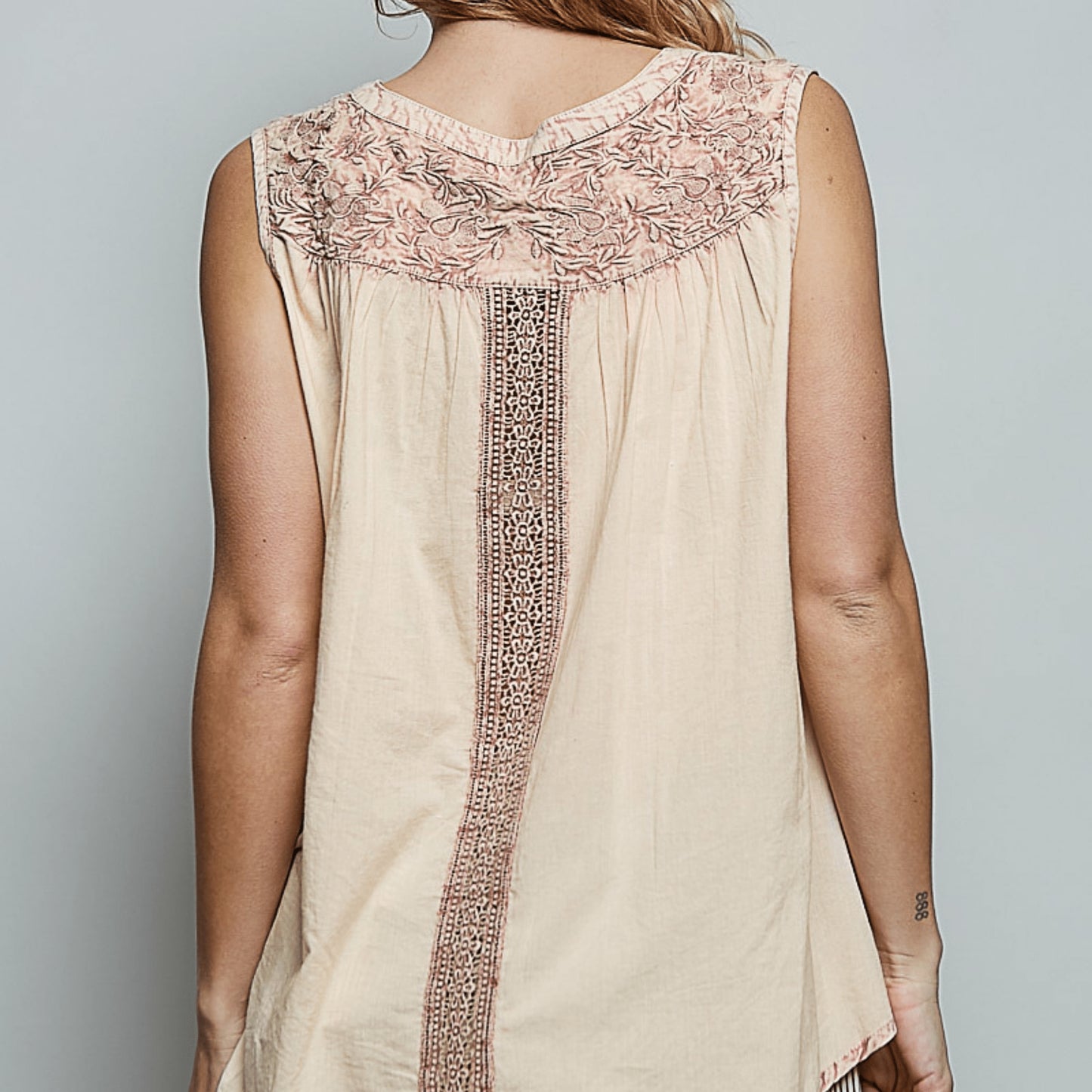 Back view of the POL crochet tank highlighting the relaxed, flowy fit.