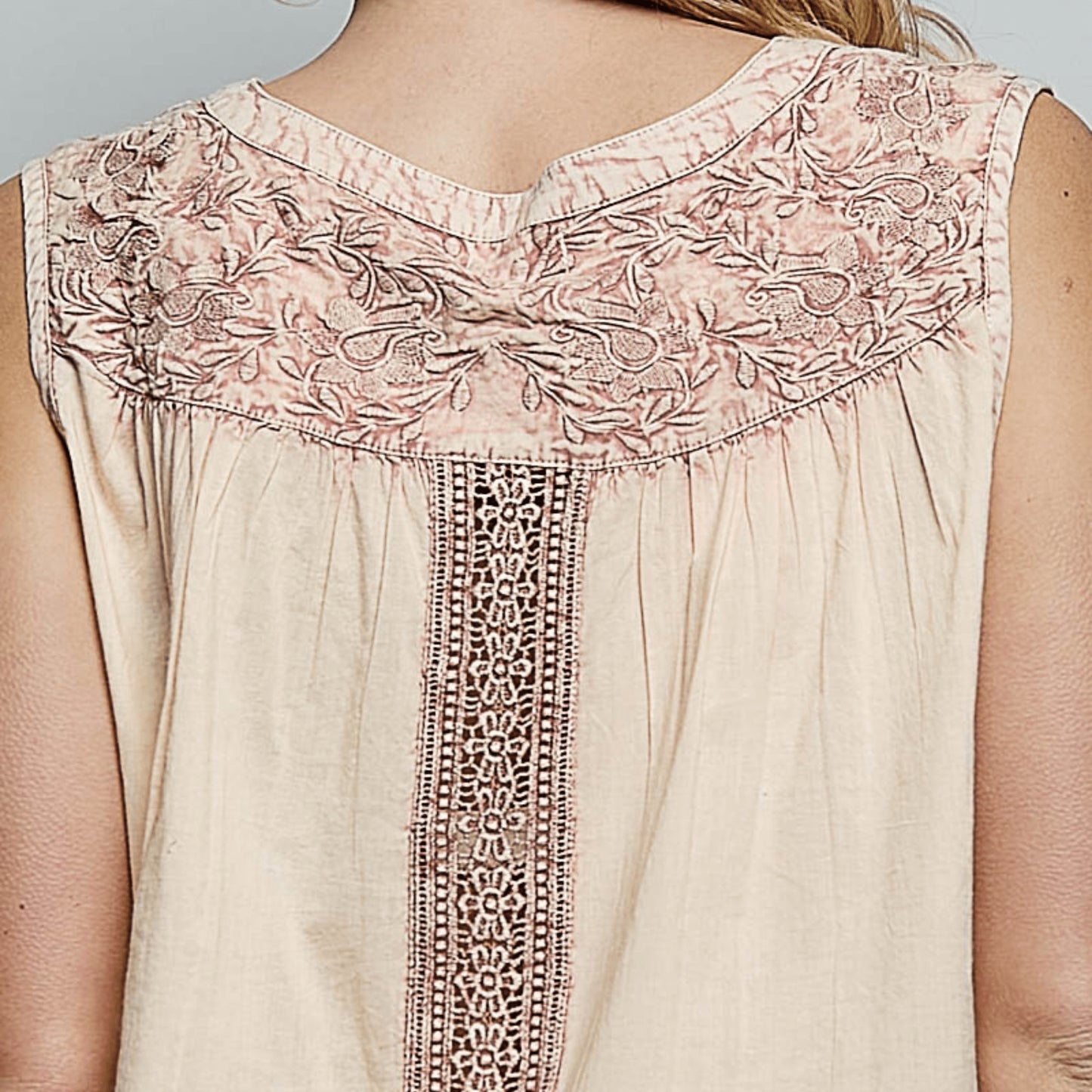 Detailed close-up of the intricate crochet contrast on the POL tank top.