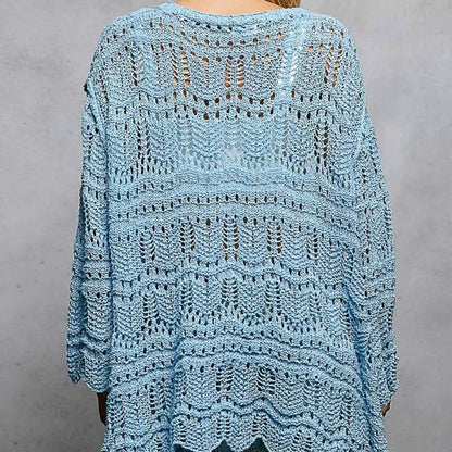 Back view of the POL sky blue cardigan showing the relaxed, oversized fit.