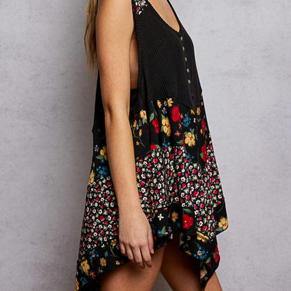 Side perspective of the POL black ribbed tank highlighting the floral pattern.