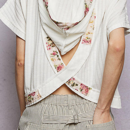 POL off white short sleeve hooded top showing stylish open back — back view.
