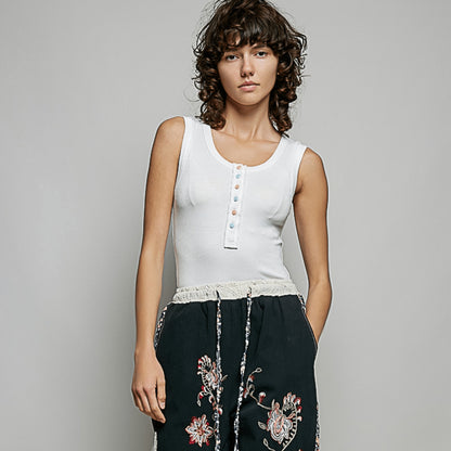 Full boutique presentation of the POL colorful button ribbed sleeveless top.