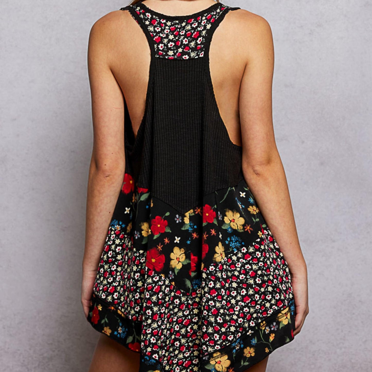 Back view of the POL black ribbed sleeveless top.