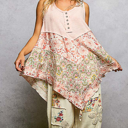 Close-up showcase of the woven floral patch and asymmetrical design.