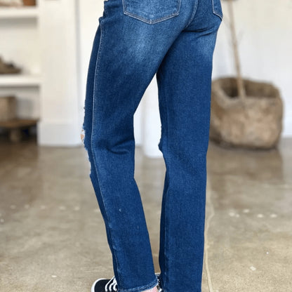 Back view of high-waist straight jeans showing fit and pockets.