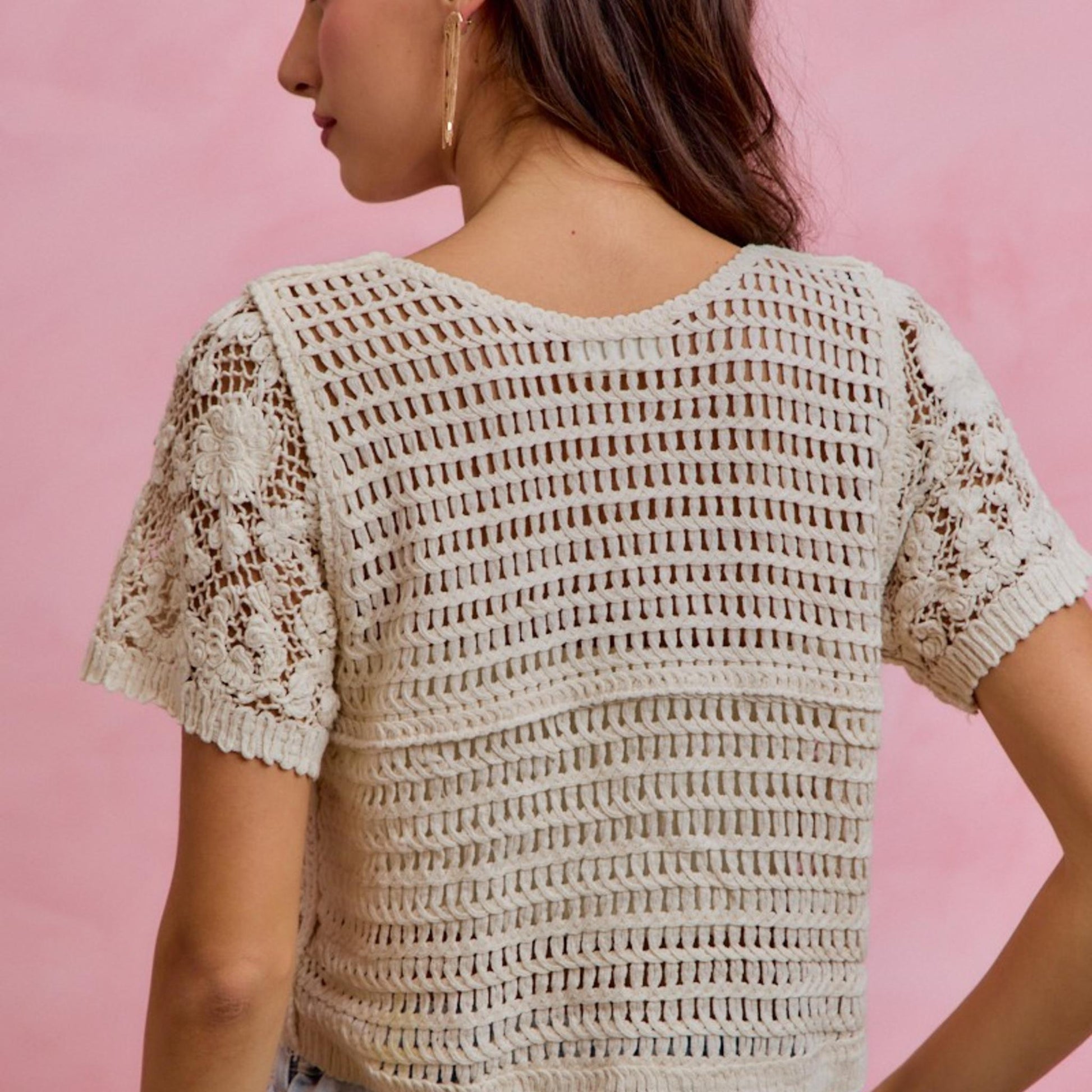 Full-length back view of the SO ME natural floral crochet lace cardigan highlighting the detailed lace construction.
