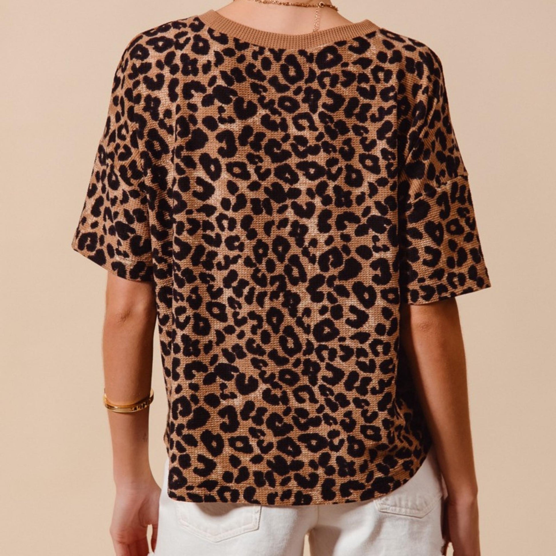 Back view of the SO ME coffee leopard waffle knit loose fit top.