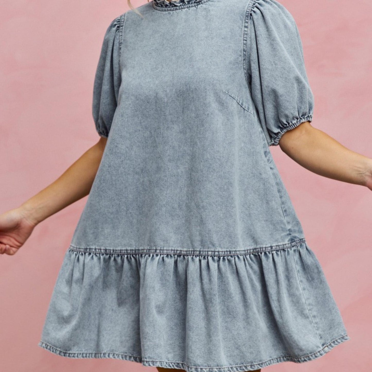 Front view of the SO ME light wash denim mini dress featuring puff sleeves.