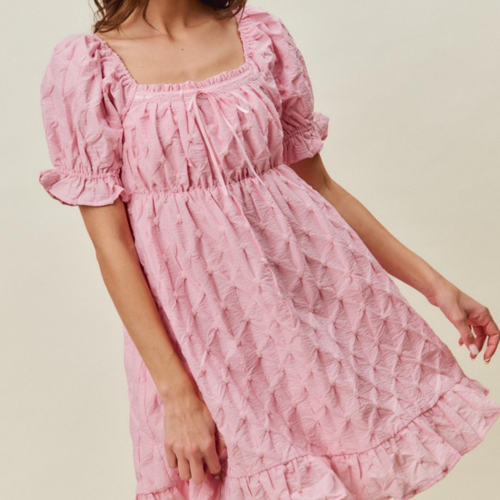 SO ME pink ruched bust mini dress styled for a brunch or special occasion.