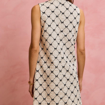 SO ME ivory black scalloped side mini dress — back view.