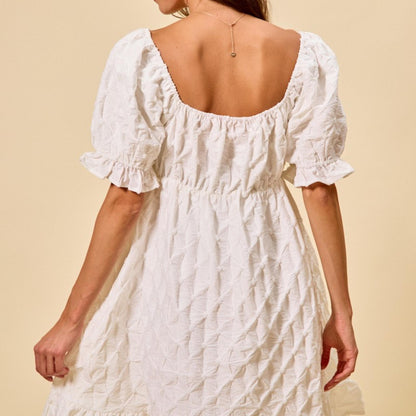 SO ME off white ruched bust mini dress styled for a night out or special event.
