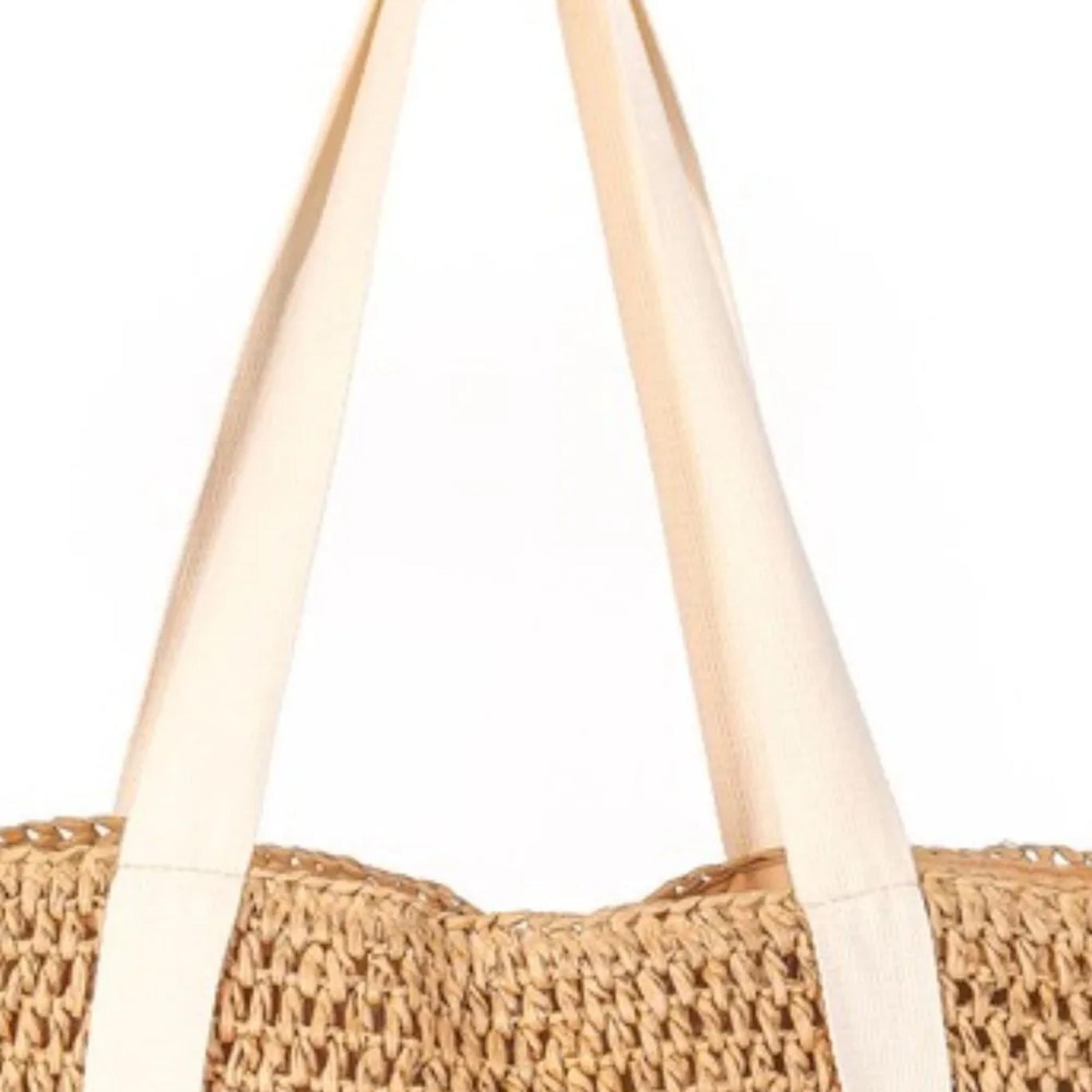 Camel-colored woven hat carrier tote bag highlighting the intricate braided straw texture.