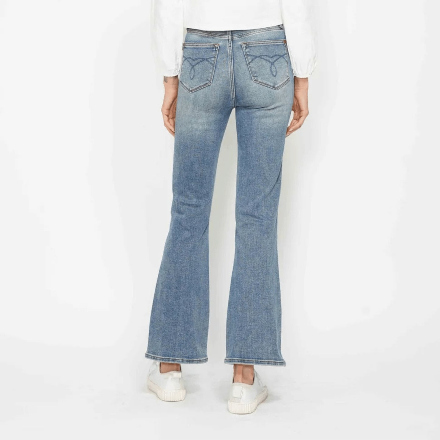 Back view of Judy Blue bootcut jeans showing the decorative pocket embroidery.
