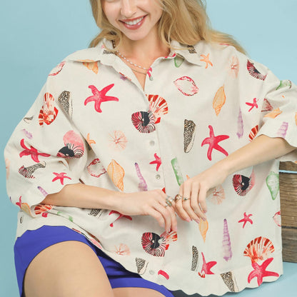 Additional lifestyle view of the Umgee starfish print top for a relaxed summer outfit.
