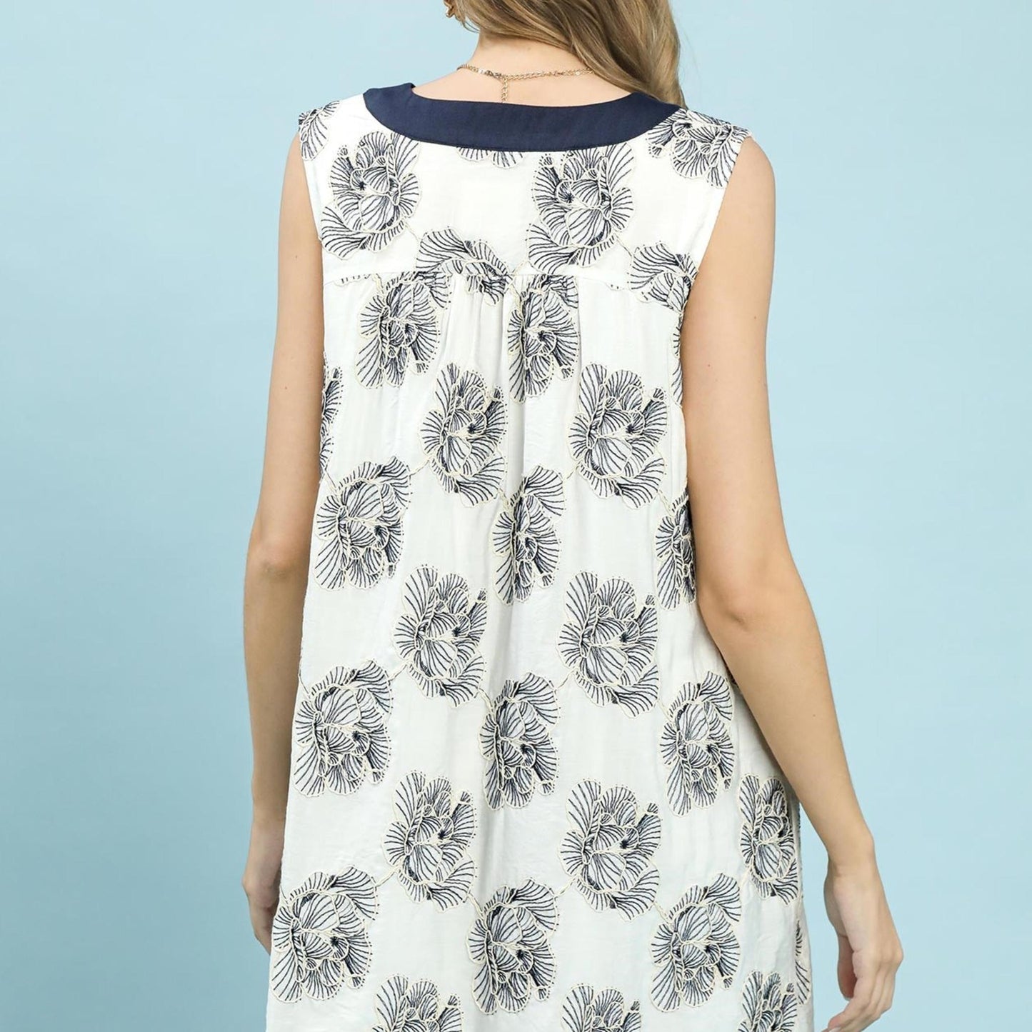 Back view of the Umgee floral sleeveless mini dress showing the relaxed, breezy fit.