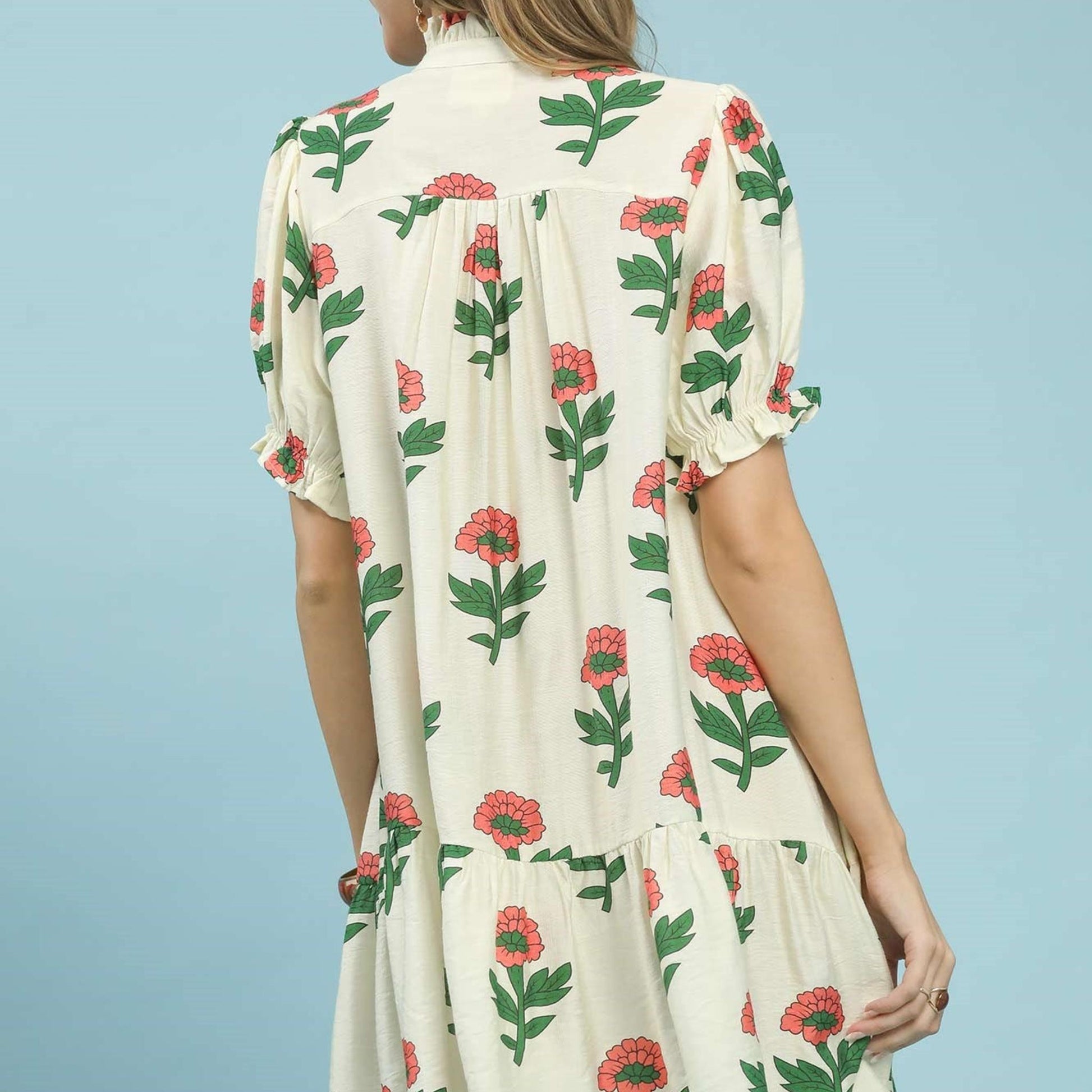 Back view of the Umgee floral dress highlighting the elegant button closure at the neckline.
