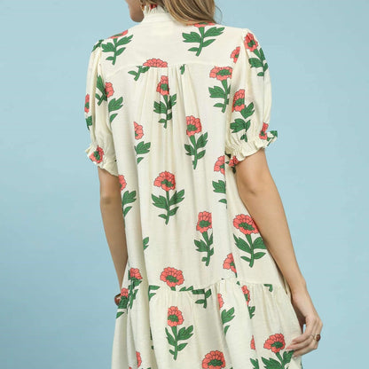 Back view of the Umgee floral dress highlighting the elegant button closure at the neckline.