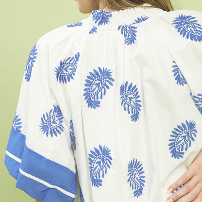 Close-up of the intricate paisley embroidery and V-neckline on the Umgee boho dress.