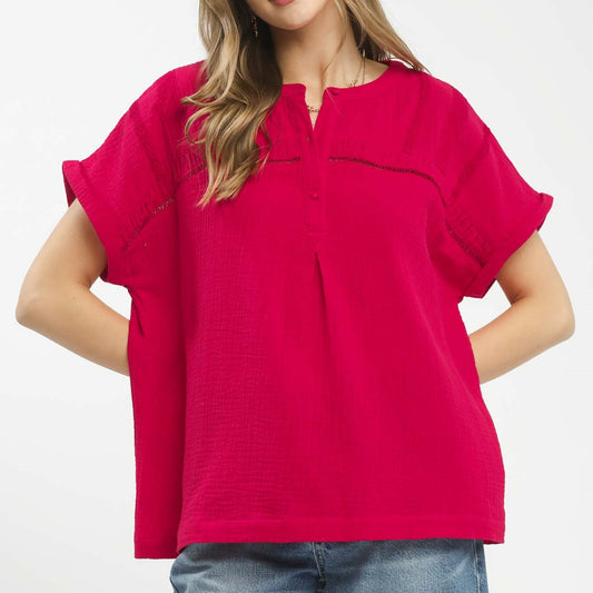 Front view of the Umgee red textured gauze split-neck boho blouse.