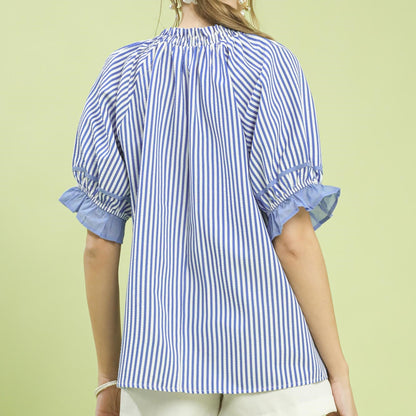 Back view of the royal blue stripe blouse showing the flowy, relaxed silhouette.