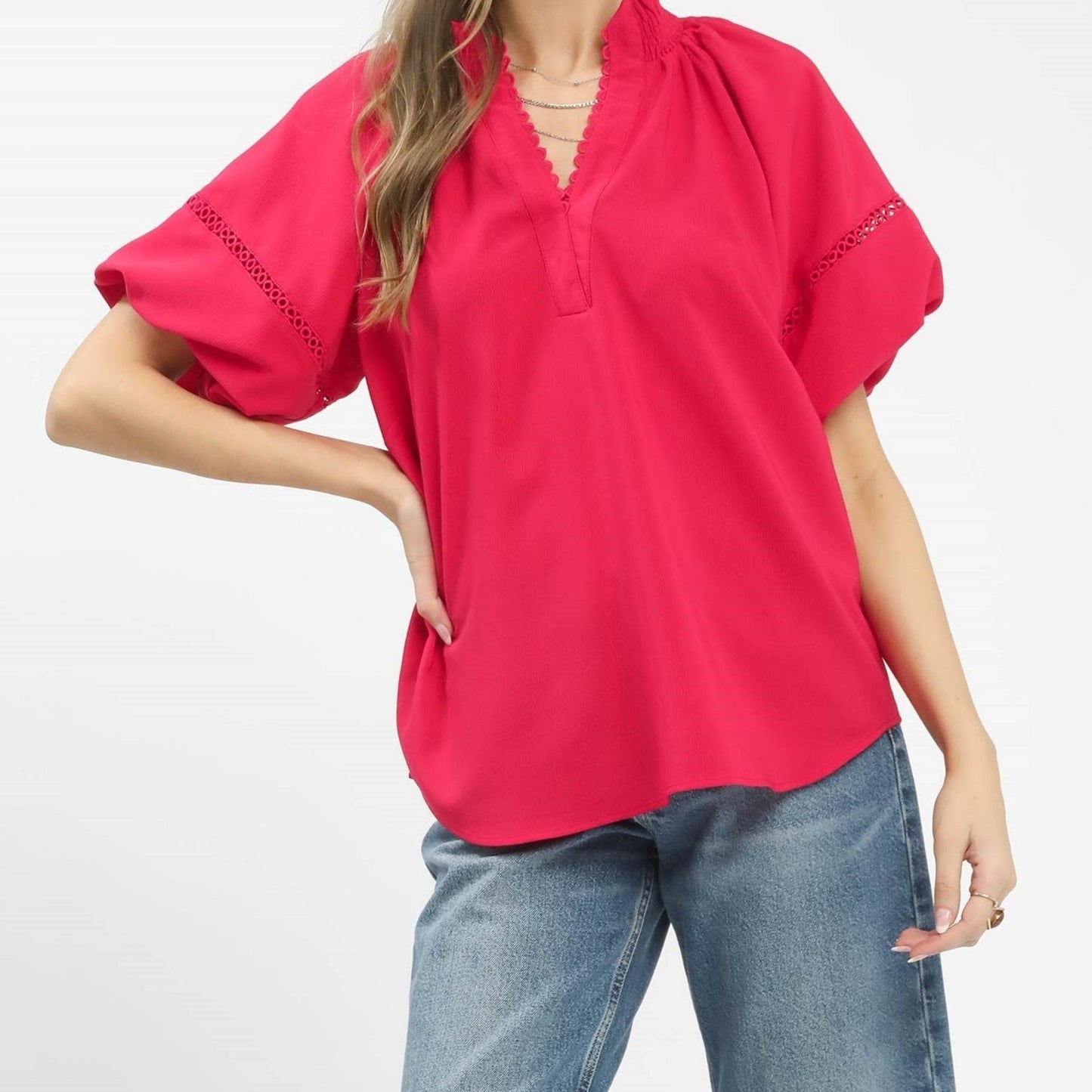 Front view of the Umgee teaberry pink lace trim peasant top.