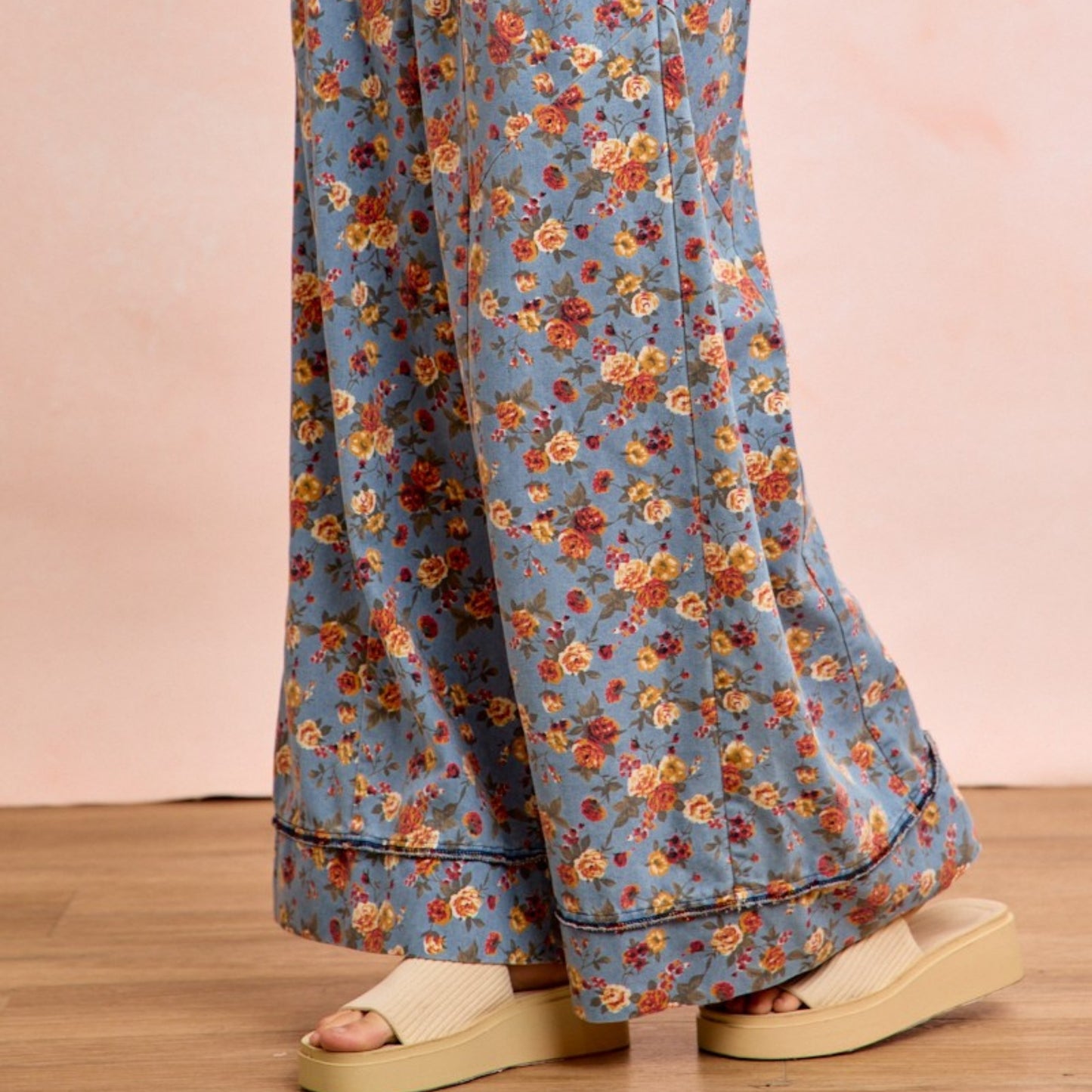 Floral-patterned pants with a plain background