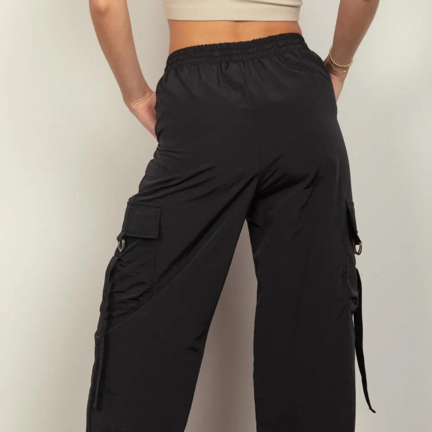 Very J black woven elastic waist cargo pants — back view.