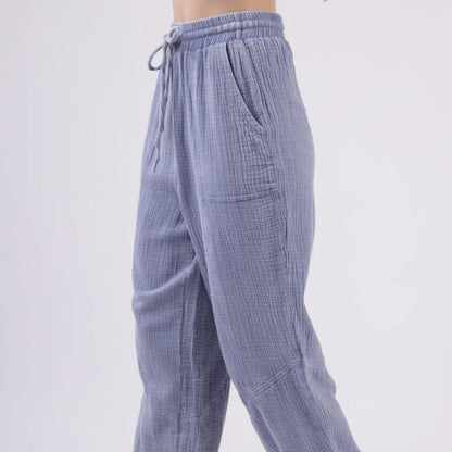 Very J denim blue washed crinkle gauze drawstring cargo pants — lifestyle view.