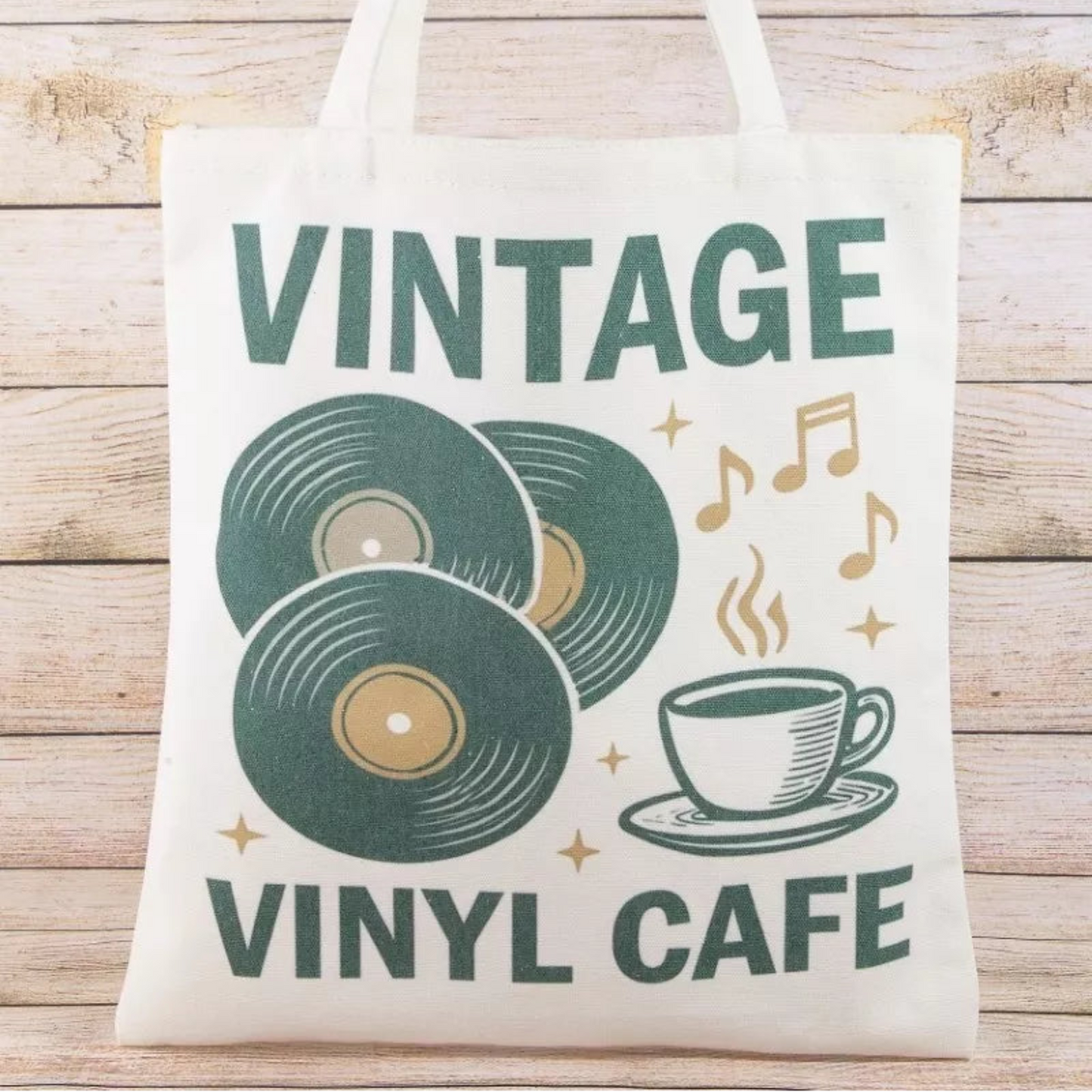 Retro tote bag with a vintage vinyl cafe print and sturdy black shoulder straps