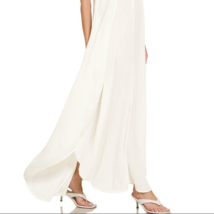 Front view of the ivory cami maxi dress showing the elegant silhouette and crinkle texture.
