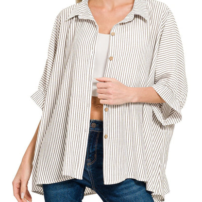 Front view of the warm brown striped boxy shirt showing the functional button-down front.