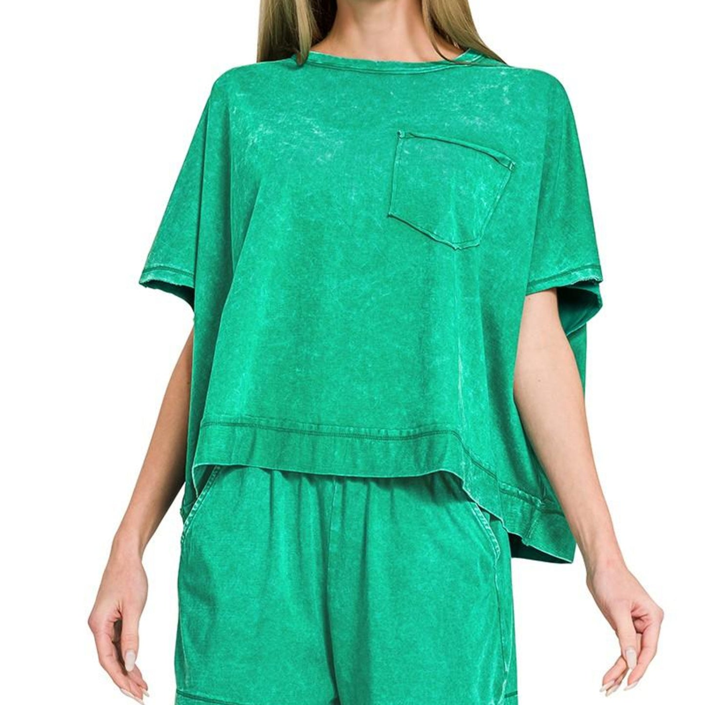 Green oversized t-shirt with a pocket on a white background