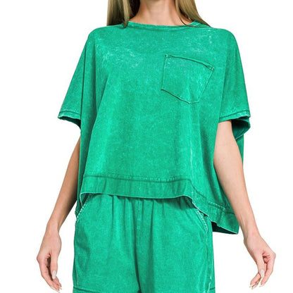 Green oversized t-shirt with a pocket on a white background