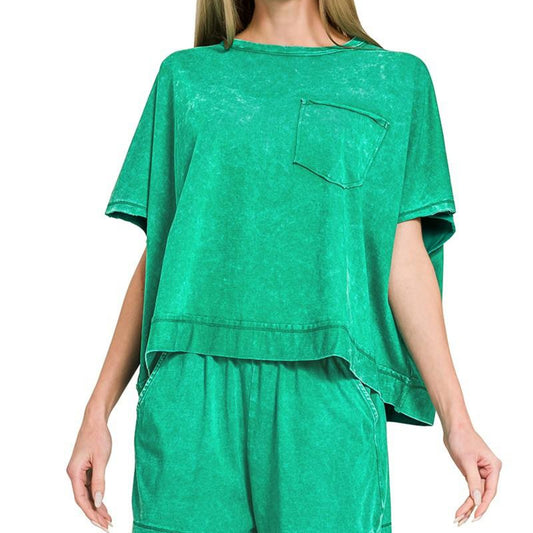 Green oversized t-shirt with a pocket on a white background