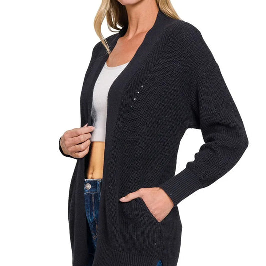 Front view of Zenana Eyelet Open Sweater Cardigan in Black showing pockets.