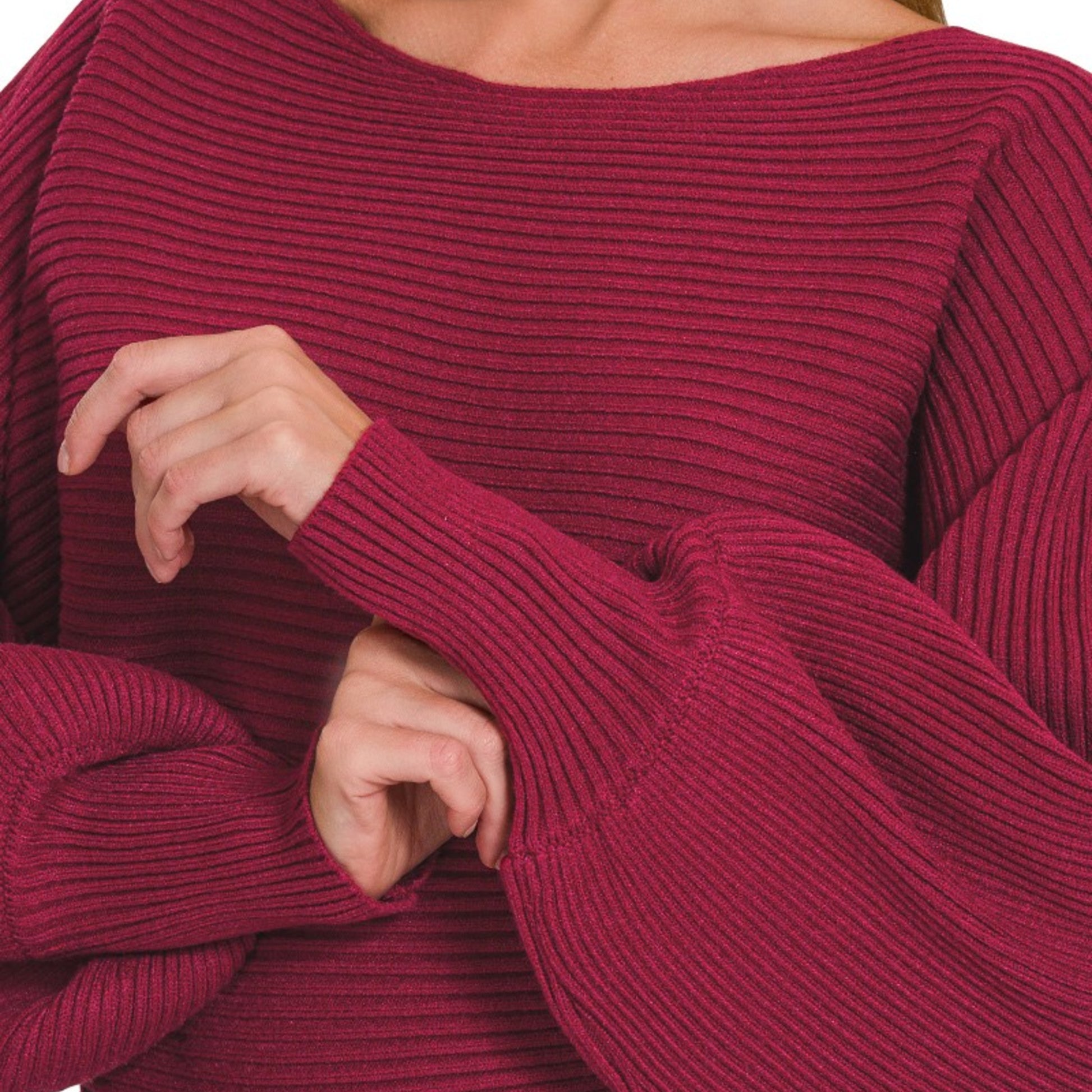 Close-up of the ribbed texture and balloon sleeve detail on the Cabernet sweater.
