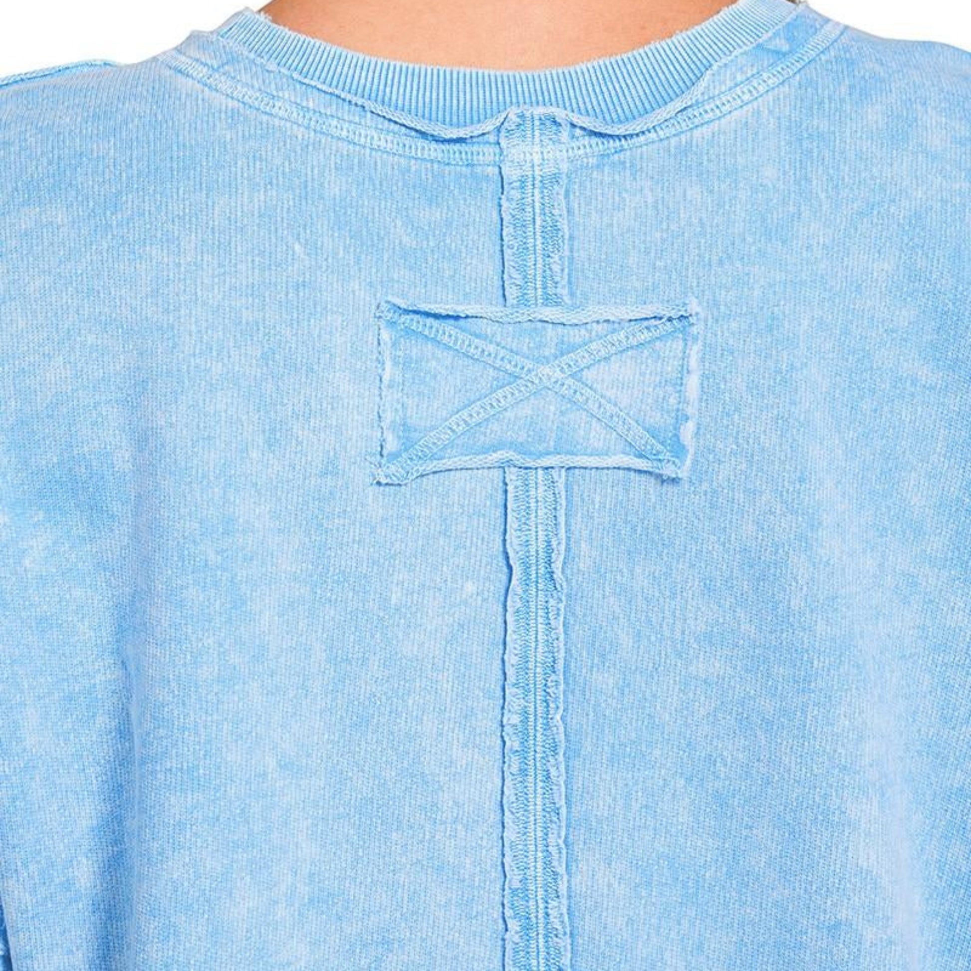 Back seam detail of Zenana halo washed French terry sweatshirt sky blue oversized boutique pullover