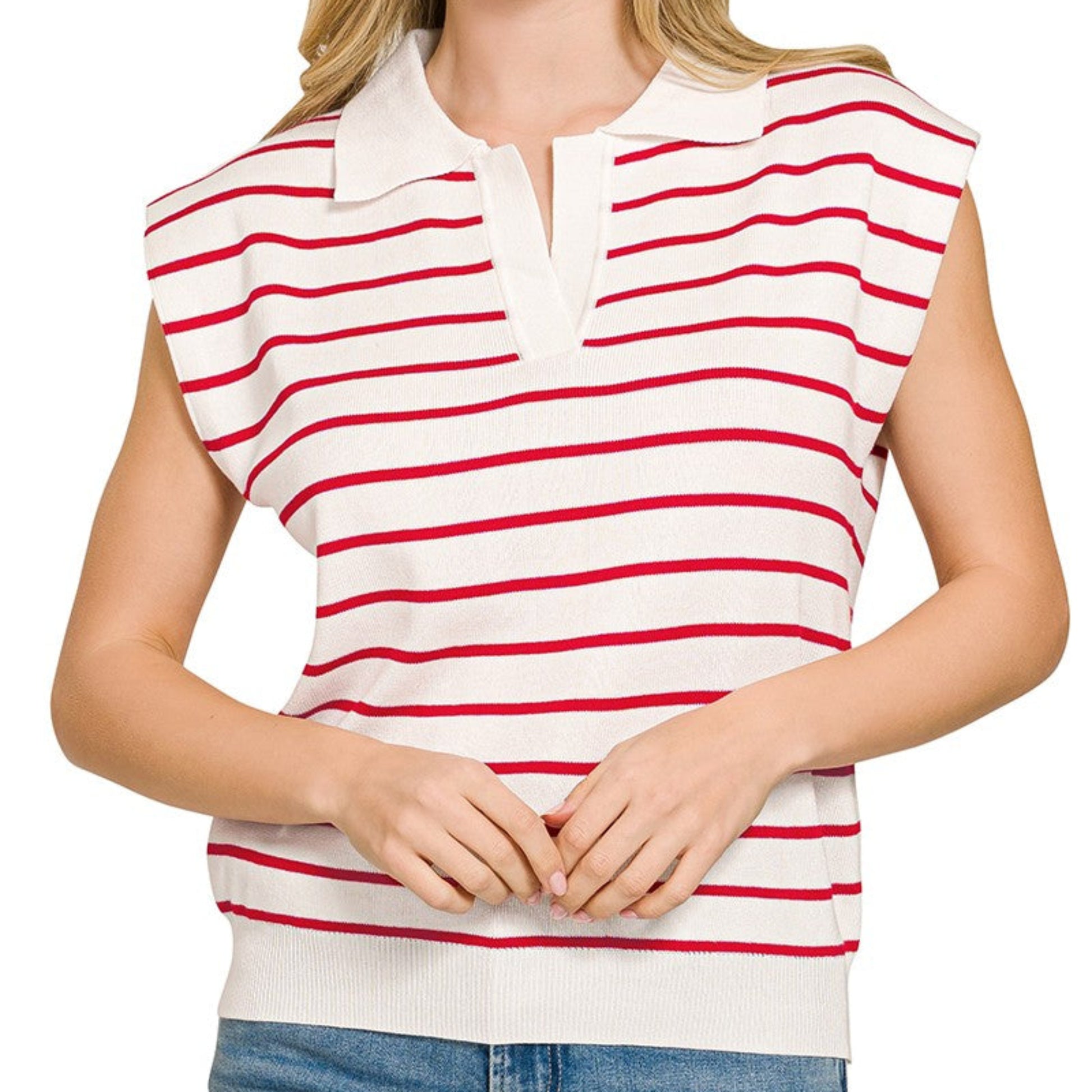 Model wearing the Zenana striped ruby and ivory sweater vest during a coastal morning reset.