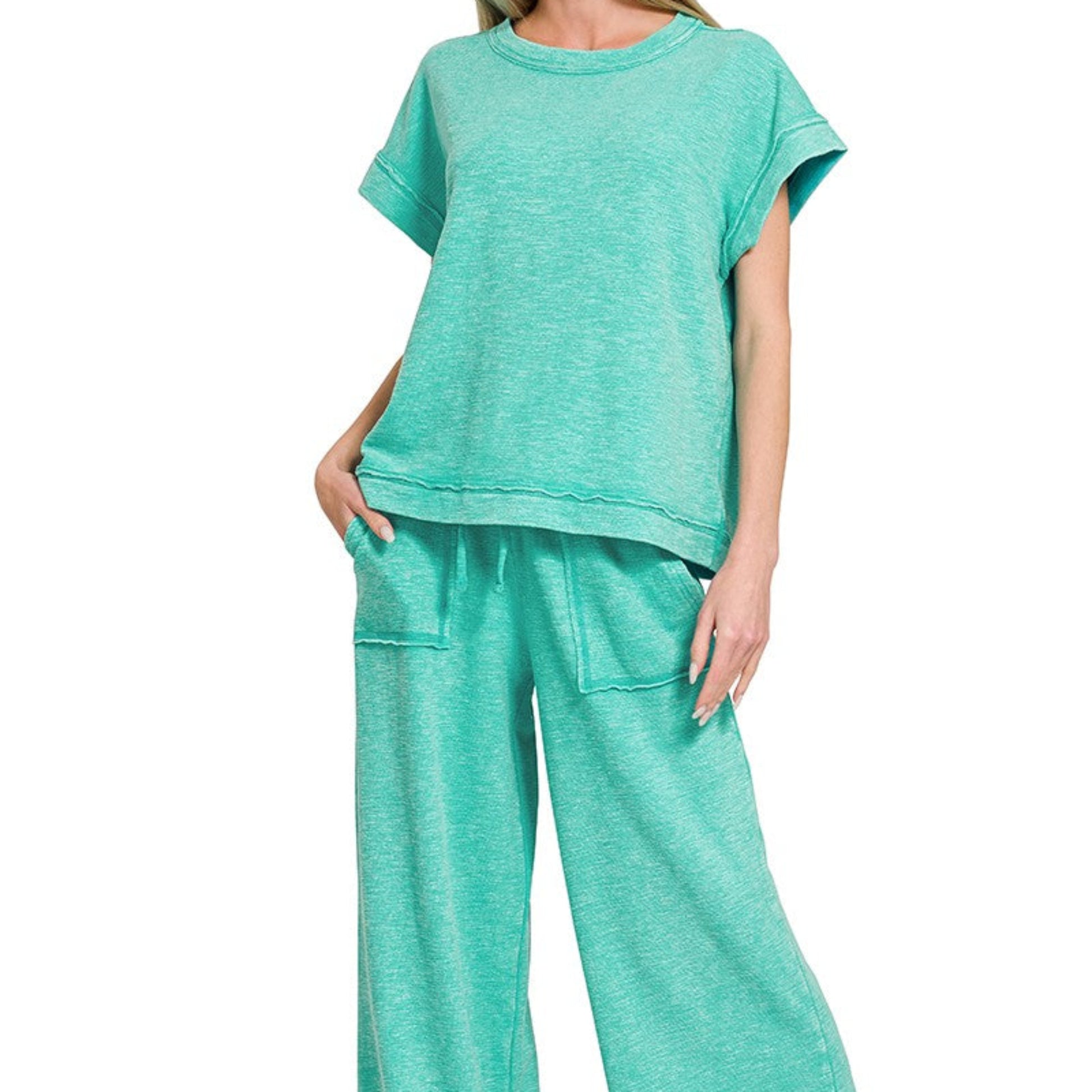 Model wearing the turquoise Zenana washed slub set for a realistic coastal morning look.