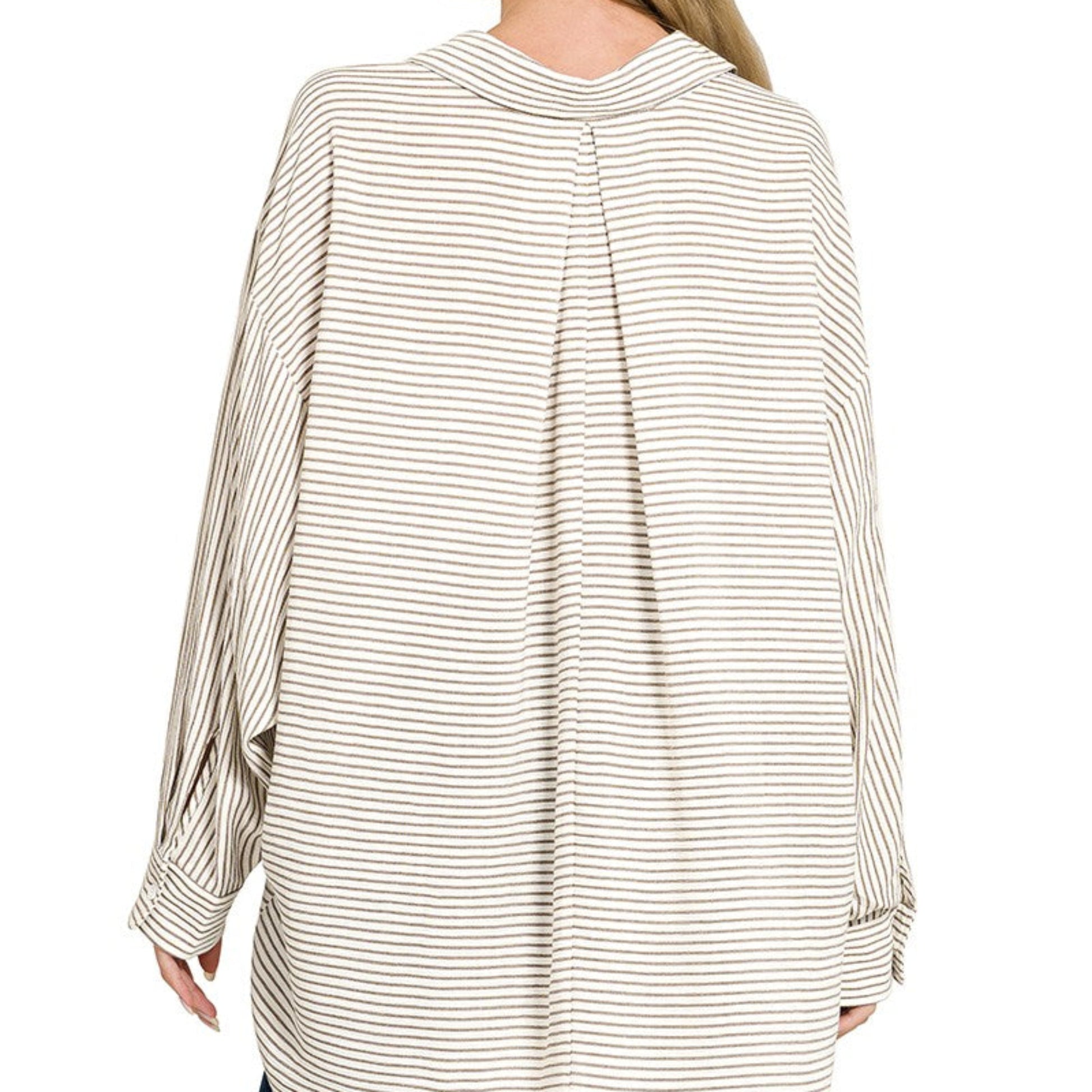 Rear view of the striped woven shirt highlighting the clean lines and soft drape.