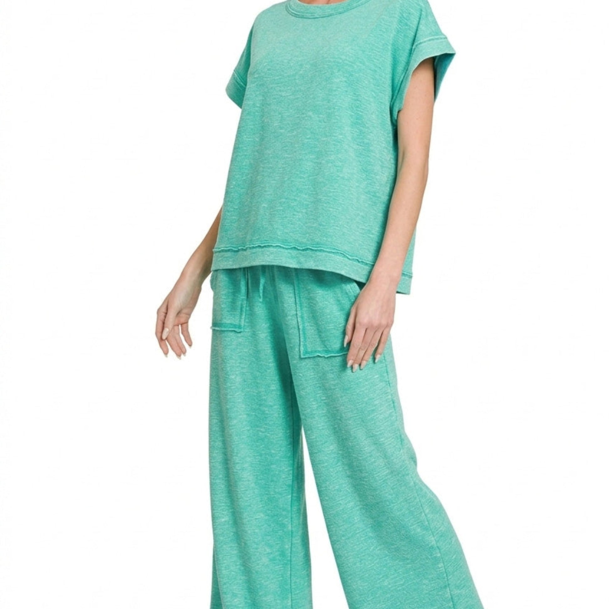 Professional boutique display of the turquoise matching set on a minimalist wooden hanger.